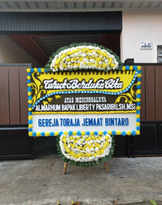Papan Bunga Duka di Toboko